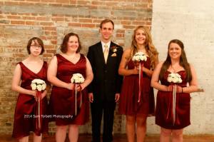 Bridesmaids with the groom